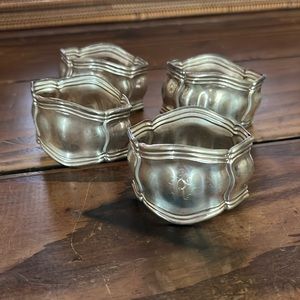 Set of 4 sterling silver napkin rings